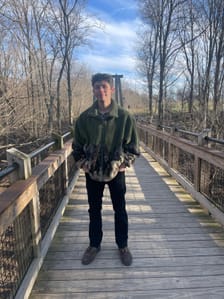 Brandon Baird, consulting forester, in the field