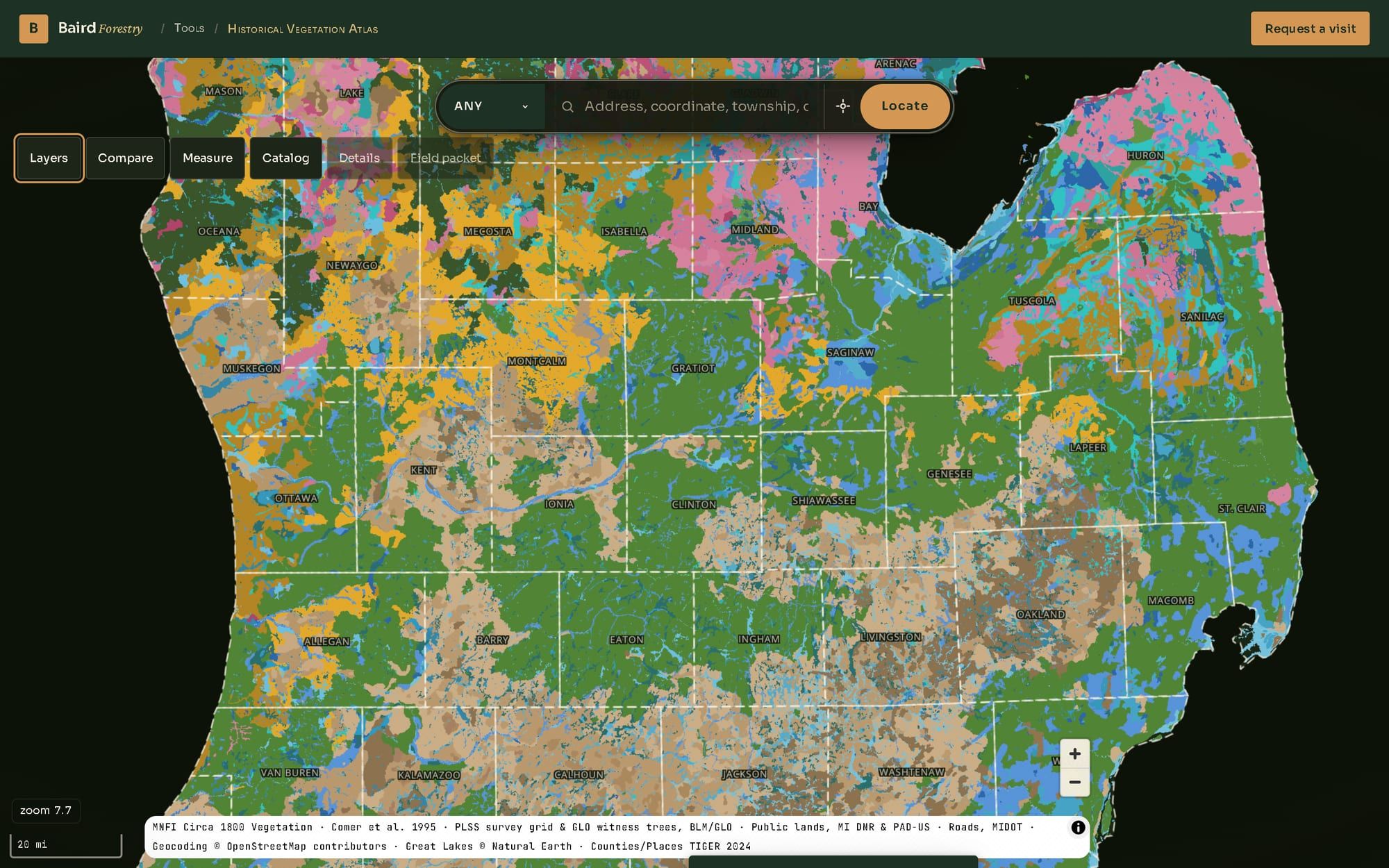 The historical vegetation atlas showing southern Lower Michigan around 1800 at county scale, a patchwork of forest in green, oak country in tan and wetlands in blue, with county names, the search bar and the atlas controls